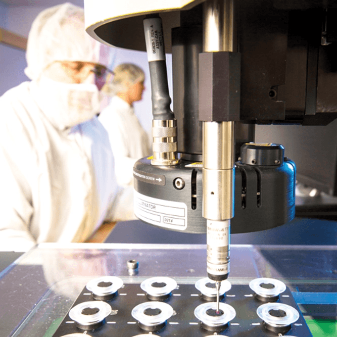 Employee in clean room production